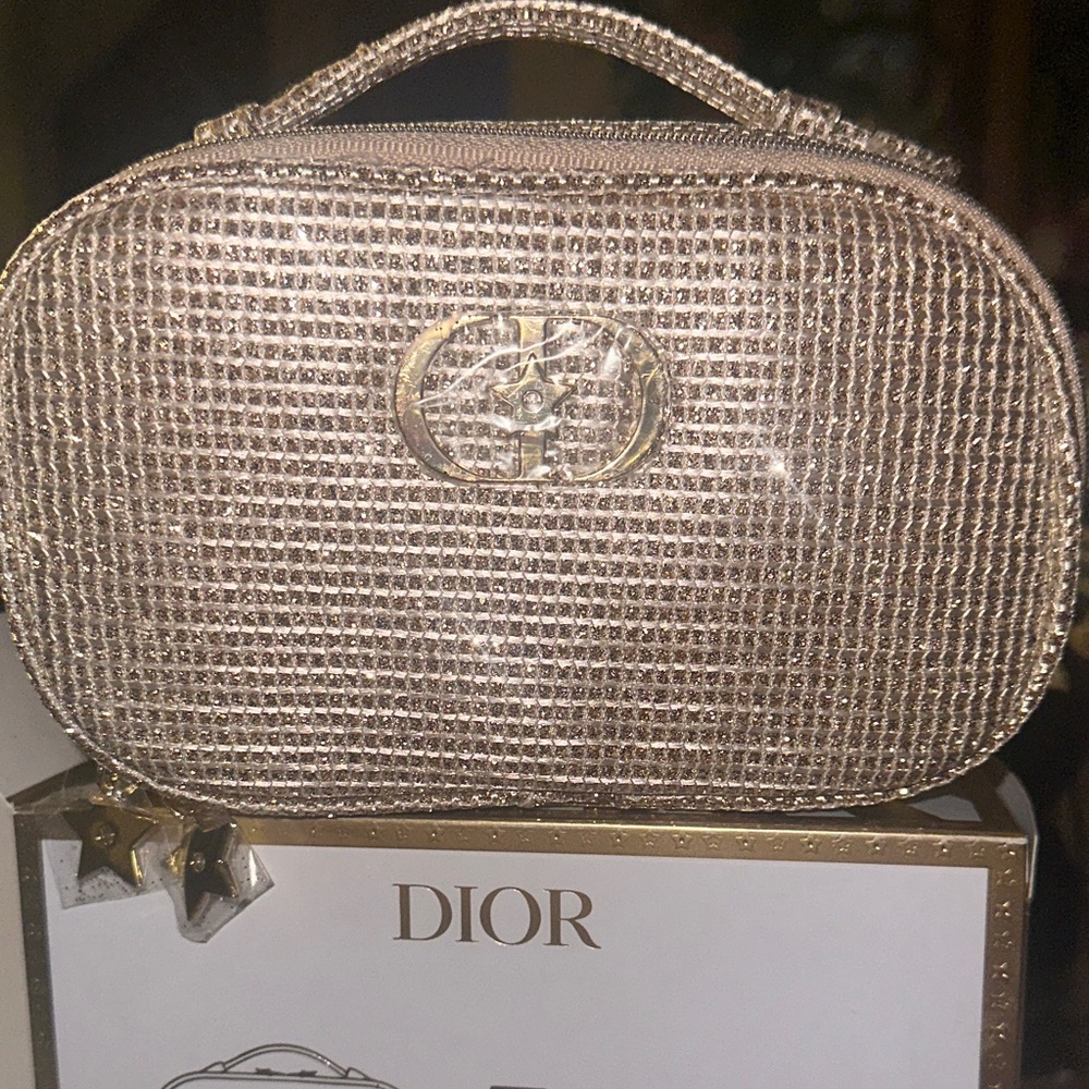 Dior Gold luxury traveling cosmetic bag withbling and two star charm pulls